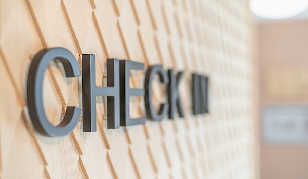 Stuub Check In Kachelwand